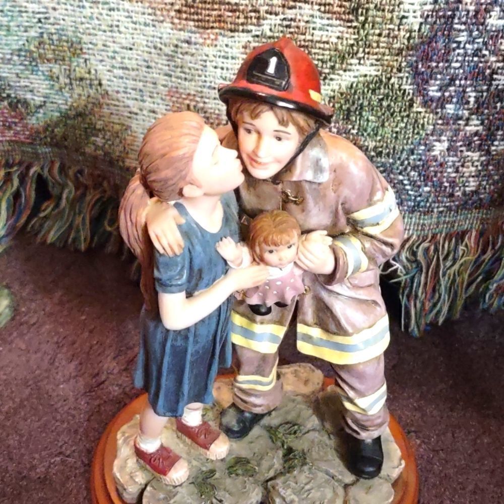 Vintage 1998 Vanmark Red Hats of Courage firefighter rescuing girl's doll